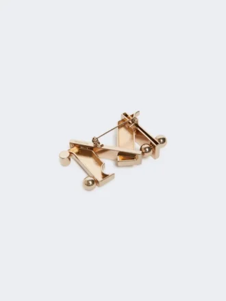 Alfinete de metal com monograma, dourado