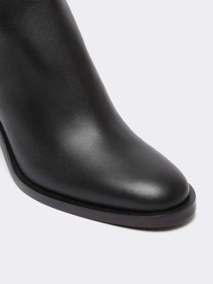 Botas de couro, pretas Botas de couro, pretas