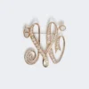 Broche com monograma e strass, marfim Broche com monograma e strass, marfim