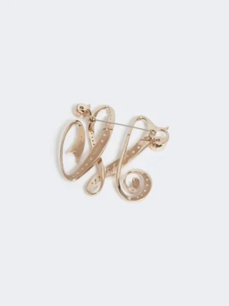 Broche com monograma e strass, marfim