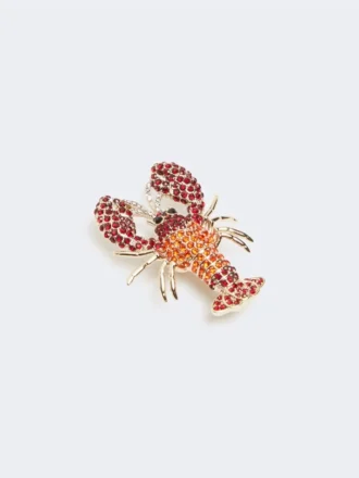 Broche em metal com strass, vermelho escuro