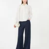 Camisa de algodão com bolso no peito, cor marfim Camisa de algodão com bolso no peito, cor marfim