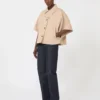 Capa em gabardine repelente à água, albino
