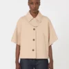 Capa em gabardine repelente à água, albino