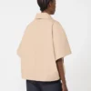 Capa em gabardine repelente à água, albino