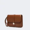 Clutch em pele lisa, cor tabaco