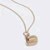 Colar comprido com pendente em forma de selo, dourado Colar comprido com pendente em forma de selo, dourado