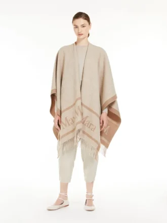 Poncho de lã jacquard, bege Poncho de lã jacquard, bege