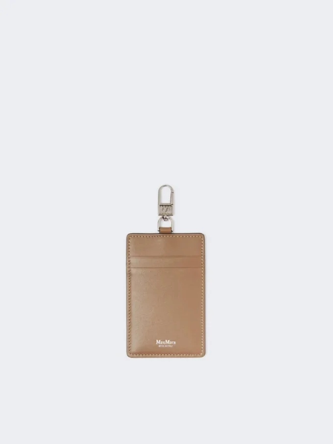 Porta-crachá em pele, cor lama Porta-crachá em pele, cor lama